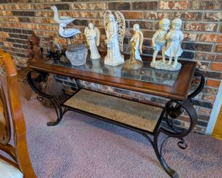 glass-top couch table and figurines