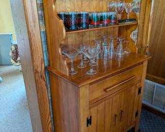 oak wood bar cabinet, drinking glasses