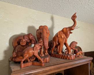 vintage hand-carved elephants, Buddha, and more