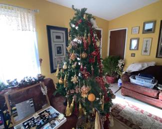 red & gold manor house decor on tree and below