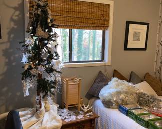 Silver & white tree plus all the decor on the bed!