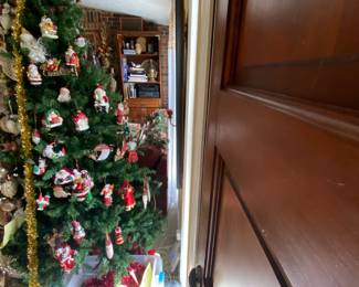 All Santas on tree and in bin below