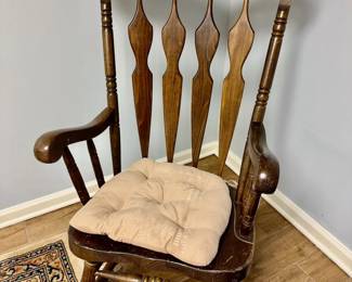 antique wood rocking chair with decorative painted floral details