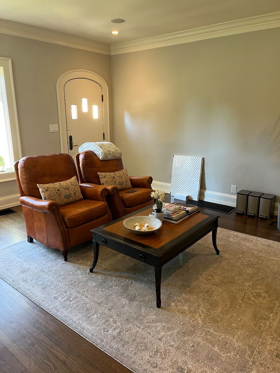 Bradington Young Reclining chairs. Theodore Alexander coffee table. 