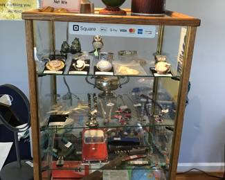 Showcase with gold, sterling, cameos, vintage banks and much more!