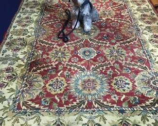 Area rug with Bentley waiting to greet you!