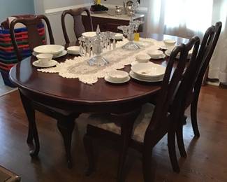 Queen Anne style dining room table with 6 chairs….8 place settings of China
