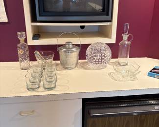 Crystal decanters, ice bucket and glassware
