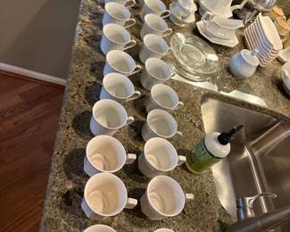 Many coffee cups with matching saucers available