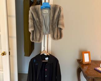 Women's fur bolero, women's hat and women's sweater. 