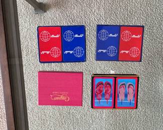 multiple sets of playing cards, including vintage card sets from the Budd company