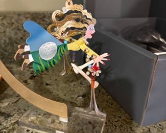Female golfer ornamental figurine