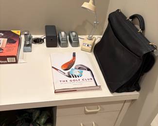 Golf Club Coffee table book. Vintage table lamp, briefcase and tape dispensers. 