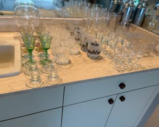 collection of cocktail and wine glasses. 