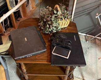 laptops and wooden side table