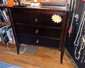 Small grey, participle board side table/platform. $10 + tax.
