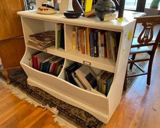 Wood multi-use shelving unit. Great for a nursery, library, toy room, etc. $75 + tax.