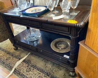 Vintage hardwood and glass console table with bamboo effect. $50 + tax