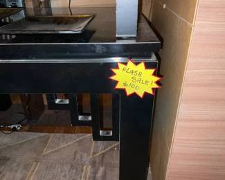 Small grey, participle board side table/platform. $10 + tax.