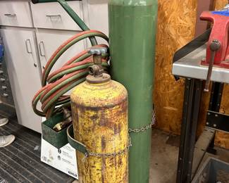 welders stand with tanks, twin hose, and regulator