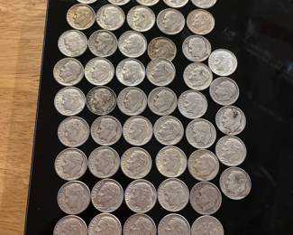 Around 900 silver dimes, also a collection of silver half dollars and quarters