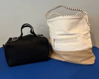 Charming Charlie tan and ivory tote handbag with studded handle.