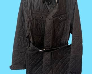Black Burberry Brit diamond quilted jacket with a belted waist and signature check collar.