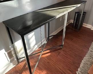 Industrial grey metal console.
