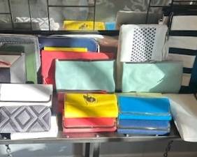 Wallets & clutch handbags.