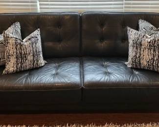 Black leather sofa