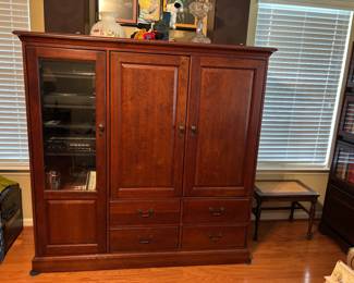 Cherry entertainment center: Stereo, LED TV and Speakers (B&W) can be included for complete system; Lots of storage in drawers