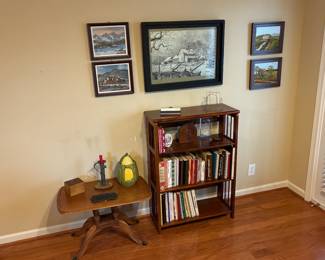 Table, shelf, and pictures