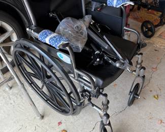 Many Wheelchairs and Walkers