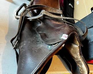 #135 Antique Saddle w/stirups $150.00