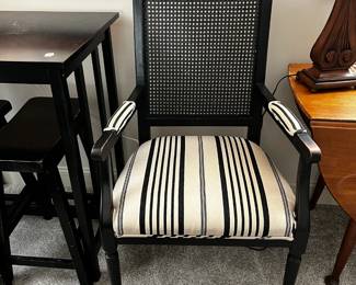 #104 Black Wood Arm Chair w/Cane Back $75.00