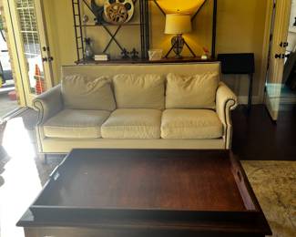 #9 Universal Furn. Cream Sofa w/loose back cushions w/nailhead trim - 75" Long (as is dog hair) $125.00
#10 Wood Coffee Table w/Large Lift-Off Tray - 51x33x16 $175.00