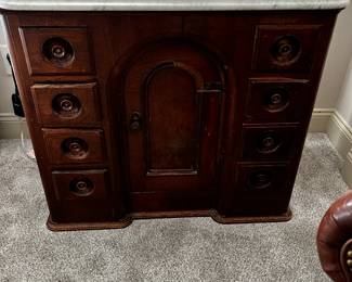 #101 Antique Wood Cabinet w/8 Drawer & 1 Door (as is one Drawer off) - w/marble Top - 33x20x30 $100.00
