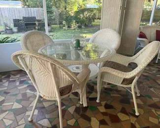 All weather wicker table and 4 chairs