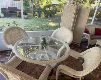 All weather wicker table and 4 chairs
