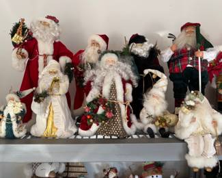 Several Santa Clause’s, figures, and ornaments.