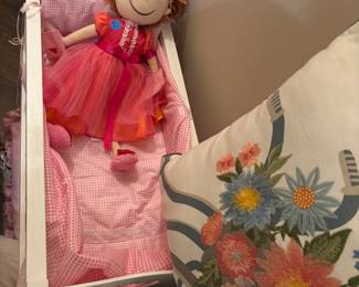 Pinkalicious doll and a white wood doll bed. Vintage dolls may drop in.