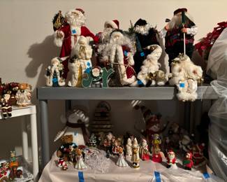 A whole bunch of Santa Claus figurines in every size and shape. Plus some ornaments left.