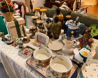 Household and frames, a few pictures. Turkey statue and Christmas decor. Utensils, wine glass sets and tons of plastic serving bowls, trays, platters and plates.