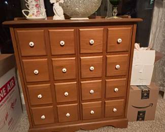 Cabinet with shelving inside, made to look like an old medicine cabinet