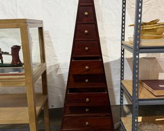 Vintage mahogany wood pyramid chest of drawers with brass handles