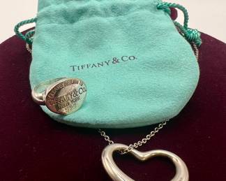 Tiffany & Co Sterling Silver Elsa Peretti Open Heart Charm Necklace. 

Return to Tiffany Sterling Silver Signet Ring. 
