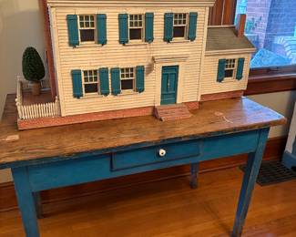 Antique doll house and old blue paint table with drawer
