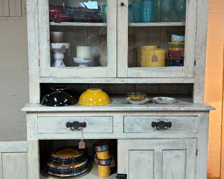 White cupboard. Wavy glass 
Dishes