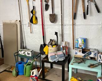 2 plastic folding tables 
Misc Garage