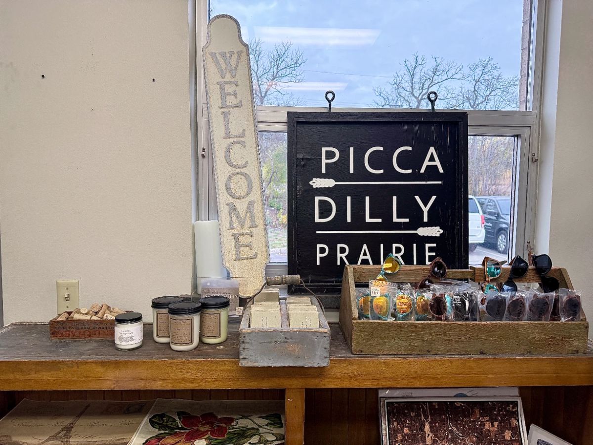 Sunglasses, Corks, and Welcome Sign